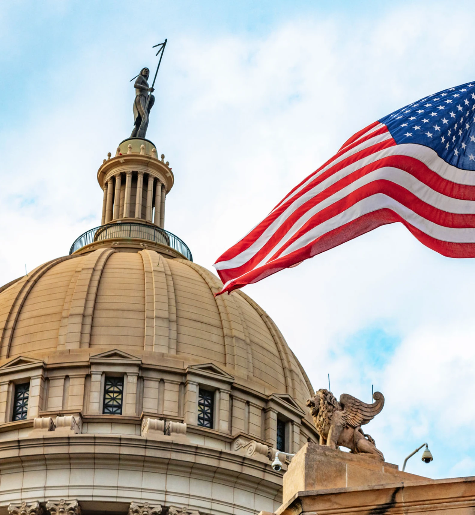 Capitol dome with American flag